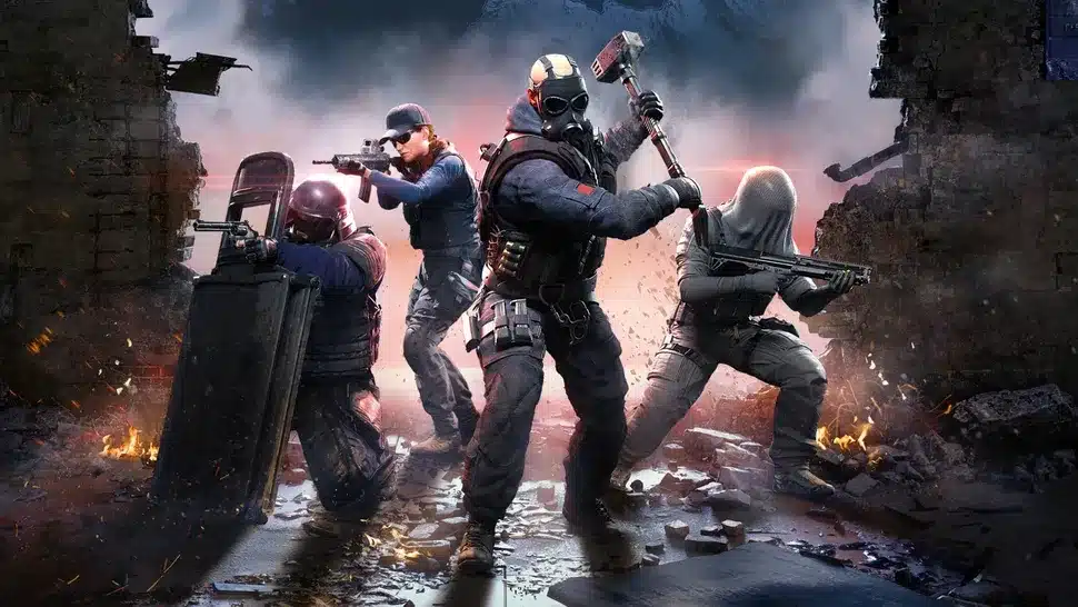 Quatre opérateurs de Rainbow Six Tactics traversent une brèche dans un mur